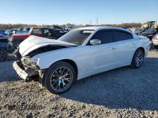2014 Dodge Charger SE with VIN 2C3CDXBG7EH284495, listed as a Copart auction lot 83147324 with 215,661 mi miles and Salvage Title. Bid and sale history available at carsss.com. Image 1.