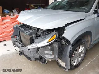 2019 Hyundai Santa Fe SE with VIN 5NMS23AD9KH035161, listed as a IAAI auction lot 41757044 with 124,835 mi miles. Bid and sale history available at carsss.com. Image 6.