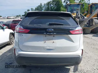 2021 Ford Edge SE with VIN 2FMPK3G99MBA55951, listed as a IAAI auction lot 42313429 with 45,152 mi miles and . Bid and sale history available at DreamBid. Image 16.