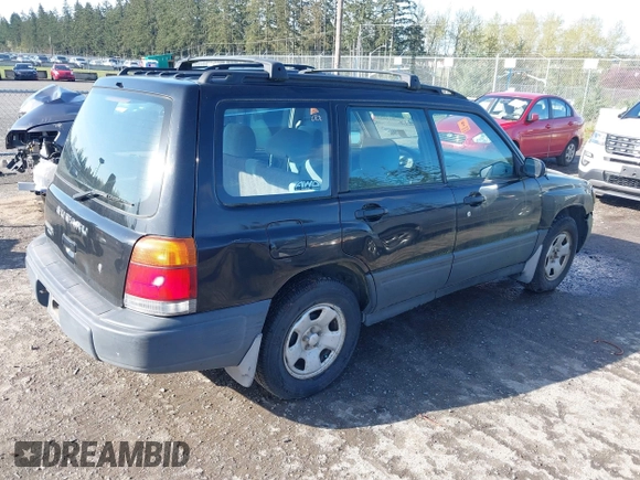 1999 Subaru Forester L with VIN JF1SF6351XH716957, listed as a IAAI auction lot 41969521 with 253,696 mi miles. Bid and sale history available at carsss.com. Image 4.