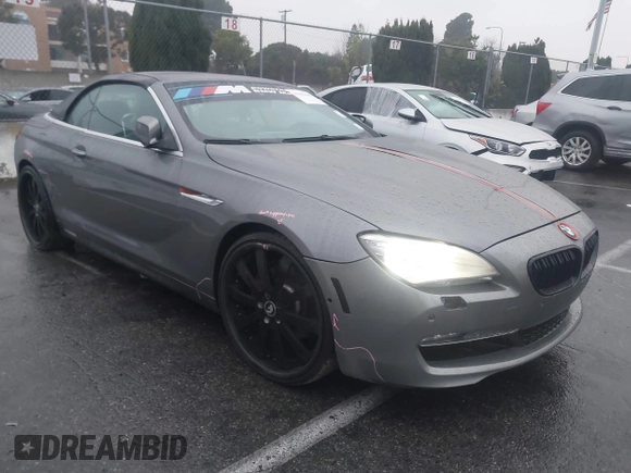 2012 BMW 6 Series 650i with VIN WBALZ3C5XCDL70748, listed as a IAAI auction lot 41502640 with 102,519 mi miles. Bid and sale history available at carsss.com. Image 1.
