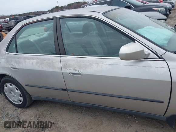 1999 Honda Accord LX z VIN 1HGCG5646XA147476, wystawiony jako IAAI lot #41752857 z przebiegiem 86 339 mil mil oraz . Historia ofert i sprzedaży dostępna na DreamBid. Obrazek 13.