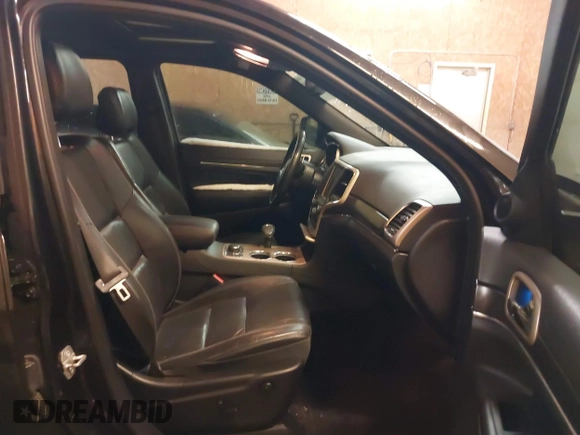2015 Jeep Grand Cherokee Limited with VIN 1C4RJFBG8FC910133, listed as a IAAI auction lot 41289929 with 141,226 mi miles. Bid and sale history available at carsss.com. Image 5.