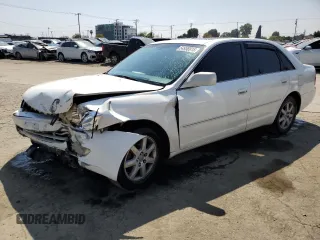 2000 Toyota Avalon XL with VIN 4T1BF28B9YU068001, listed as a Copart auction lot 54958915 with 240,232 mi miles and Salvage Title. Bid and sale history available at DreamBid. Image 1.