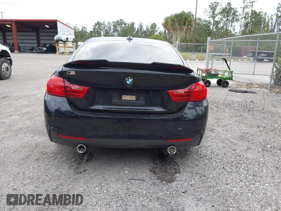 2015 BMW 4 Series 435i with VIN WBA4B1C5XFD955119, listed as a IAAI auction lot 41349918 with 181,937 mi miles and . Bid and sale history available at carsss.com. Image 17.