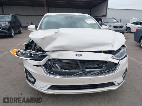 2020 Ford Fusion Titanium with VIN 3FA6P0K92LR103416, listed as a IAAI auction lot 41681810 with 54,902 mi miles and . Bid and sale history available at DreamBid. Image 6.