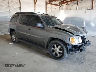 2004 GMC Envoy SLT with VIN 1GKET16S146222288, listed as a Copart auction lot 49316405 with 210,424 mi miles and Salvage Title. Bid and sale history available at DreamBid. Image 4.