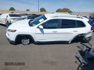2016 Jeep Cherokee High Altitude with VIN 1C4PJLDB0GW249558, listed as a IAAI auction lot 41851549 with 128,638 mi miles. Bid and sale history available at carsss.com. Image 18.