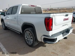 2022 GMC Sierra 1500 Limited Denali with VIN 3GTU9FEL1NG173980, listed as a IAAI auction lot 41569082 with 26,880 mi miles. Bid and sale history available at carsss.com. Image 3.