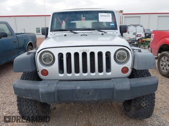 2008 Jeep Wrangler Unlimited X with VIN 1J4GA39198L651172, listed as a IAAI auction lot 41936521 with 69,007 mi miles and . Bid and sale history available at DreamBid. Image 12.