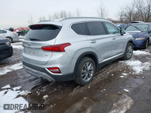 2019 Hyundai Santa Fe Ultimate with VIN 5NMS5CAD1KH000394, listed as a IAAI auction lot 41455421 with 42,886 mi miles and . Bid and sale history available at DreamBid. Image 4.