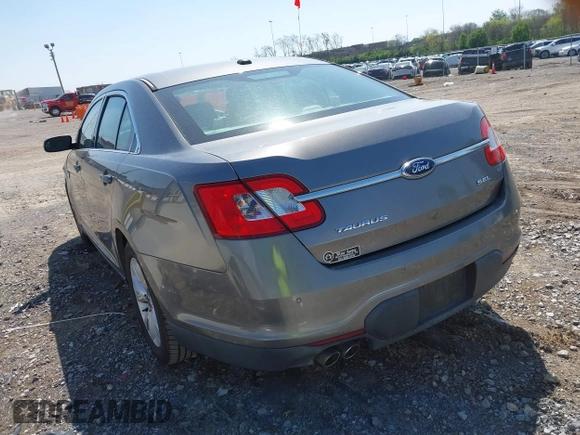 2011 Ford Taurus SEL with VIN 1FAHP2EW5BG189882, listed as a IAAI auction lot 42006542 with 208,661 mi miles. Bid and sale history available at carsss.com. Image 3.