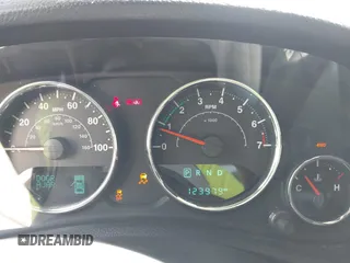 2017 Jeep Wrangler Unlimited Sahara with VIN 1C4BJWEG8HL734572, listed as a IAAI auction lot 41863636 with 123,979 mi miles. Bid and sale history available at carsss.com. Image 7.