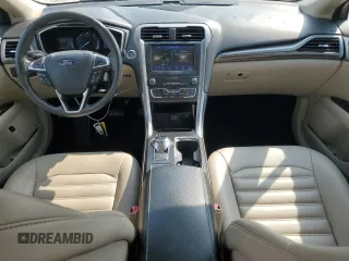 2019 Ford Fusion Hybrid SEL with VIN 3FA6P0MU9KR136851, listed as a Copart auction lot 51752575 with 104,637 mi miles and Salvage Title. Bid and sale history available at carsss.com. Image 8.