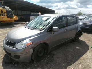 2012 Nissan Versa S with VIN 3N1BC1CP5CK246363, listed as a IAAI auction lot 36364848 with 113,429 mi miles. Bid and sale history available at carsss.com. Image 2.