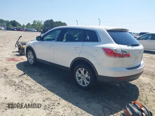 2011 Mazda CX-9 Sport with VIN JM3TB2BA7B0304087, listed as a IAAI auction lot 42138663 with 186,964 mi miles and . Bid and sale history available at DreamBid. Image 3.