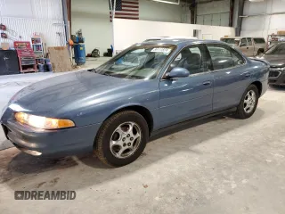 1998 Oldsmobile Intrigue GL z VIN 1G3WS52K7WF402877, wystawiony jako Copart lot #86111824 z przebiegiem 102 959 mil mil oraz Tytuł czysty. Historia ofert i sprzedaży dostępna na DreamBid. Obrazek 1.