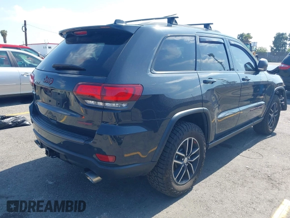 2018 Jeep Grand Cherokee Trailhawk with VIN 1C4RJFLT0JC316172, listed as a IAAI auction lot 42174162 with 81,891 mi miles and . Bid and sale history available at DreamBid. Image 4.