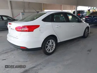 2017 Ford Focus SE with VIN 1FADP3F2XHL342823, listed as a IAAI auction lot 42496940 with 97,263 mi miles and . Bid and sale history available at DreamBid. Image 4.