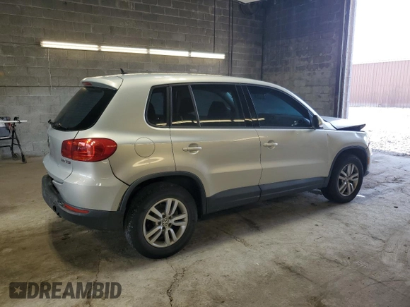 2013 Volkswagen Tiguan S with VIN WVGAV3AX9DW626065, listed as a Copart auction lot 58014145 with 128,858 mi miles and Salvage title. Bid and sale history available at DreamBid. Image 3.