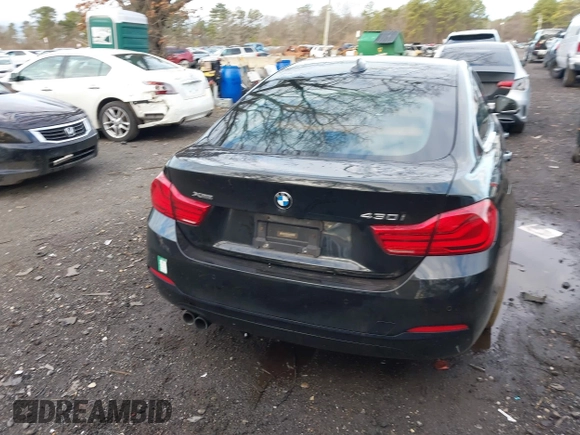 2018 BMW 4 Series 430i xDrive with VIN WBA4J3C56JBG91516, listed as a IAAI auction lot 41824273 with 102,932 mi miles and . Bid and sale history available at DreamBid. Image 16.