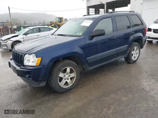 2006 Jeep Grand Cherokee Laredo with VIN 1J4GR48KX6C135070, listed as a IAAI auction lot 41966282 with 142,833 mi miles. Bid and sale history available at carsss.com. Image 2.