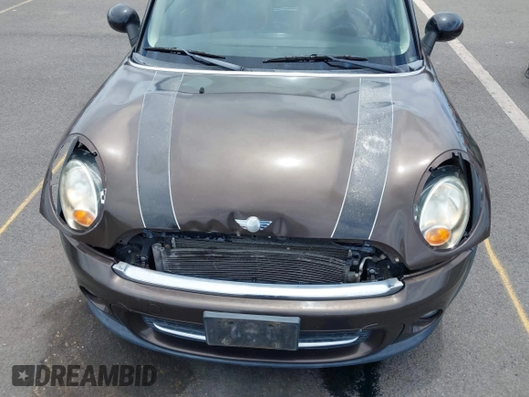 2012 MINI Hardtop with VIN WMWSU3C58CT261401, listed as a IAAI auction lot 42191548 with 96,115 mi miles and . Bid and sale history available at DreamBid. Image 6.
