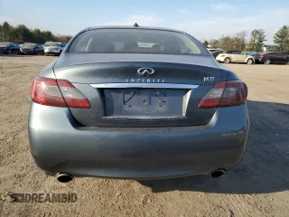 2012 Infiniti M with VIN JN1BY1AP9CM331047, listed as a Copart auction lot 49730015 with 125,263 mi miles and Salvage Title. Bid and sale history available at DreamBid. Image 6.