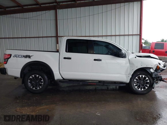 2021 Nissan Titan Pro-4X z VIN 1N6AA1ED7MN511004, wystawiony jako IAAI lot #42184599 z przebiegiem 36 086 mil mil oraz . Historia ofert i sprzedaży dostępna na DreamBid. Obrazek 14.