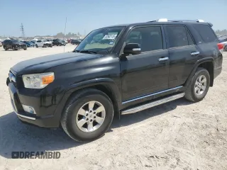 2012 Toyota 4Runner SR5 z VIN JTEZU5JR6C5033917, wystawiony jako Copart lot #52992115 z przebiegiem 180 564 mil mil oraz Czysty tytuł • Clean title. Historia ofert i sprzedaży dostępna na DreamBid. Obrazek 1.