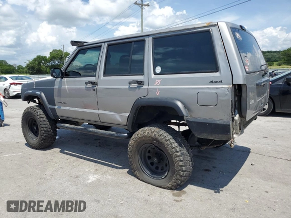 2000 Jeep Cherokee SE with VIN 1J4FF28SXYL140930, listed as a Copart auction lot 59191035 with 248,598 mi miles and Salvage title. Bid and sale history available at DreamBid. Image 2.