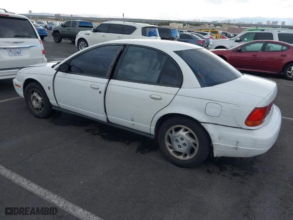 1997 Saturn SL with VIN 1G8ZK5275VZ254745, listed as a IAAI auction lot 41686816 with 135,074 mi miles. Bid and sale history available at carsss.com. Image 3.
