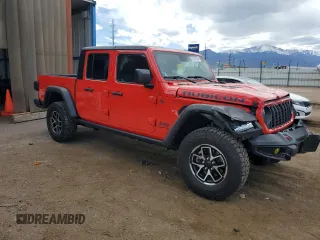 2024 Jeep Gladiator Rubicon z VIN 1C6JJTBG7RL105165, wystawiony jako Copart lot #57459125 z przebiegiem 2 092 mil mil oraz Szkoda całkowita • Salvage title. Historia ofert i sprzedaży dostępna na DreamBid. Obrazek 4.