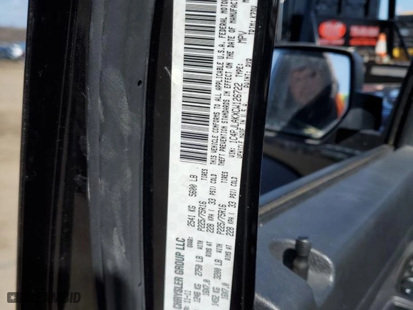 2012 Jeep Liberty Sport with VIN 1C4PJLAKXCW126722, listed as a Copart auction lot 49851825 with 100,419 mi miles and Salvage Title. Bid and sale history available at carsss.com. Image 14.
