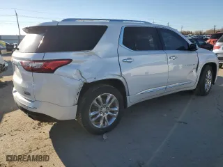 2018 Chevrolet Traverse High Country with VIN 1GNEVKKW0JJ139343, listed as a Copart auction lot 87722385 with 128,143 mi miles and Salvage Title. Bid and sale history available at carsss.com. Image 3.