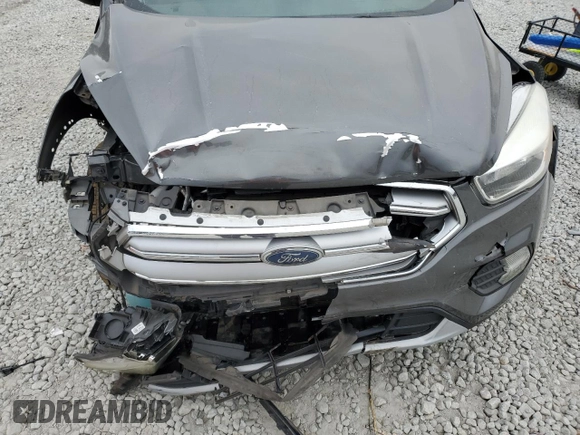 2017 Ford Escape SE with VIN 1FMCU0GD5HUC67421, listed as a Copart auction lot 86633734 with 82,929 mi miles and Salvage Title. Bid and sale history available at DreamBid. Image 12.