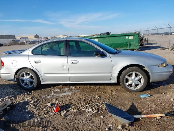 2004 Oldsmobile Alero GL1 z VIN 1G3NL52E94C189058, wystawiony jako IAAI lot #41224615 z przebiegiem 208 921 mil mil oraz . Historia ofert i sprzedaży dostępna na DreamBid. Obrazek 13.