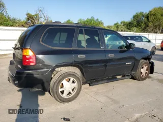 2003 GMC Envoy SLE with VIN 1GKDS13S232329083, listed as a Copart auction lot 73147534 with 212,645 mi miles and Salvage Title. Bid and sale history available at DreamBid. Image 3.