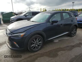 2017 Mazda CX-3 Grand Touring z VIN JM1DKFD75H0141048, wystawiony jako Copart lot #55752185 z przebiegiem 89 960 mil mil oraz Szkody całkowita. Historia ofert i sprzedaży dostępna na DreamBid. Obrazek 1.