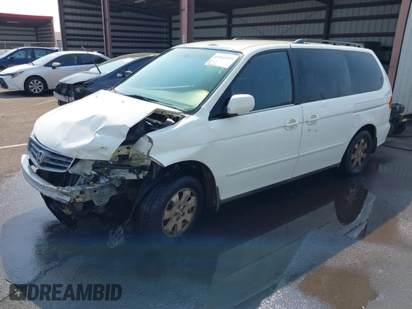 2002 Honda Odyssey EX z VIN 2HKRL18632H556791, wystawiony jako IAAI lot #41562553 z przebiegiem 222 976 mil mil oraz . Historia ofert i sprzedaży dostępna na DreamBid. Obrazek 18.
