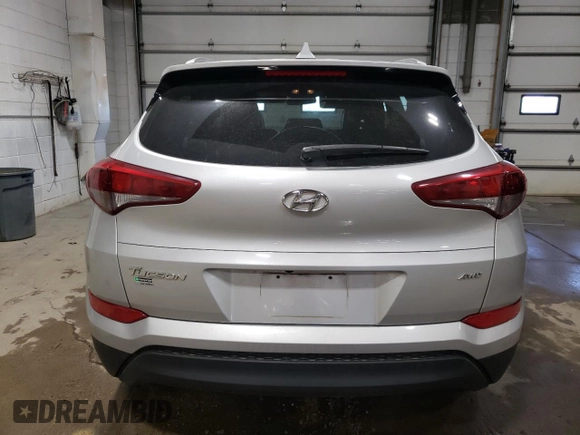 2018 Hyundai Tucson SEL z VIN KM8J3CA4XJU716201, wystawiony jako Copart lot #56790405 z przebiegiem 107 639 mil mil oraz Szkoda całkowita • Salvage title. Historia ofert i sprzedaży dostępna na DreamBid. Obrazek 6.
