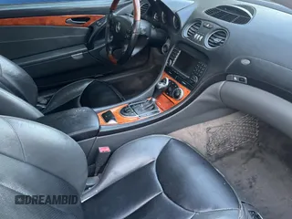 2005 Mercedes-Benz SL 500 z VIN WDBSK75F35F093334, wystawiony jako Copart lot #59240565 z przebiegiem 122 760 mil mil oraz Czysty tytuł • Clean title. Historia ofert i sprzedaży dostępna na DreamBid. Obrazek 5.
