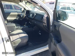 2018 Toyota Tacoma SR with VIN 5TFRX5GNXJX117613, listed as a IAAI auction lot 41630248 with 113,339 mi miles. Bid and sale history available at carsss.com. Image 5.