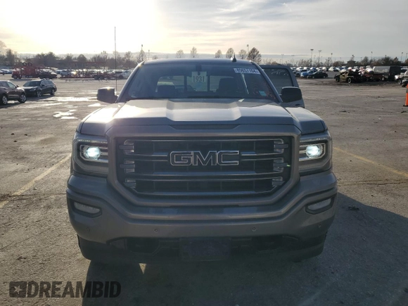 2017 GMC Sierra 1500 SLT z VIN 3GTU2NEJ4HG364956, wystawiony jako Copart lot #85657104 z przebiegiem 116 430 mil mil oraz Szkoda całkowita • Salvage title. Historia ofert i sprzedaży dostępna na DreamBid. Obrazek 5.