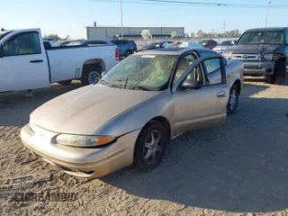 2004 Oldsmobile Alero GL1 z VIN 1G3NL52E34C191243, wystawiony jako IAAI lot #41536825 z przebiegiem 117 998 mil mil oraz . Historia ofert i sprzedaży dostępna na DreamBid. Obrazek 19.