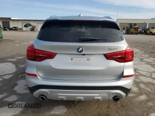 2018 BMW X3 xDrive30i with VIN 5UXTR9C59JLD59797, listed as a Copart auction lot 52063755 with Not Provided miles and Salvage Title. Bid and sale history available at DreamBid. Image 6.