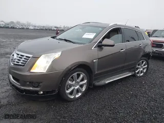 2014 Cadillac SRX Performance Collection with VIN 3GYFNCE30ES635570, listed as a IAAI auction lot 41084932 with 85,298 mi miles. Bid and sale history available at carsss.com. Image 17.