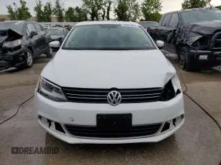 2014 Volkswagen Jetta TDI w/Premium with VIN 3VWLL7AJ2EM410482, listed as a Copart auction lot 53691984 with 77,421 mi miles and Salvage title. Bid and sale history available at DreamBid. Image 5.