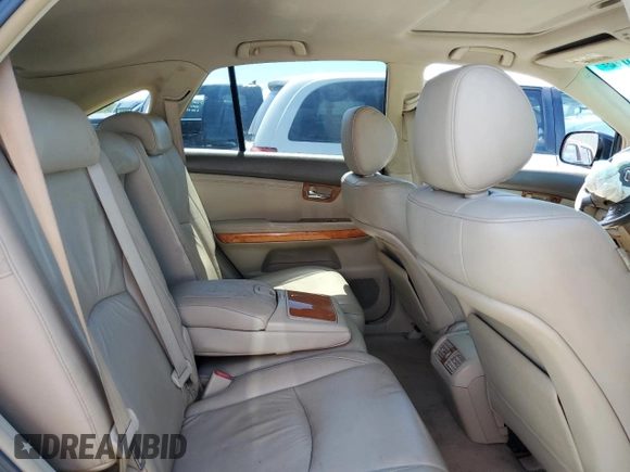 2005 Lexus RX 330 z VIN 2T2GA31UX5C031926, wystawiony jako Copart lot #57992015 z przebiegiem 216 623 mil mil oraz Szkoda całkowita • Salvage title. Historia ofert i sprzedaży dostępna na DreamBid. Obrazek 11.