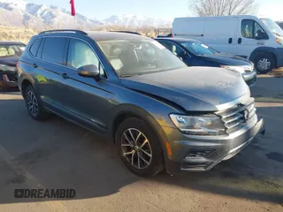 2020 Volkswagen Tiguan SE with VIN 3VV2B7AX9LM151977, listed as a IAAI auction lot 41448053 with 69,194 mi miles and . Bid and sale history available at DreamBid. Image 1.